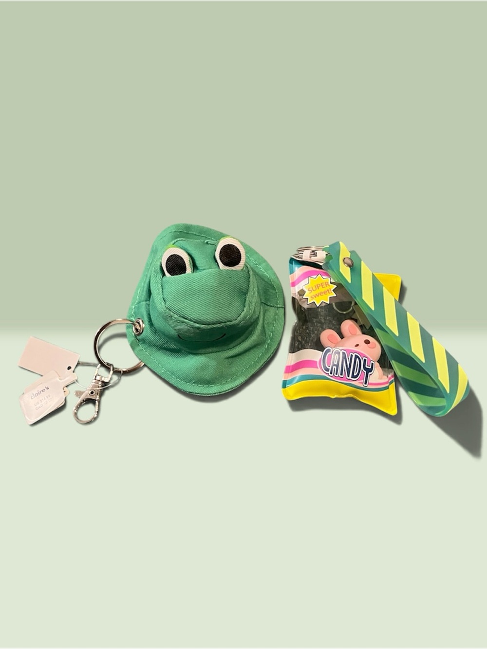 Claire's Green Frog Plush Keychain with Yellow-Striped Tag